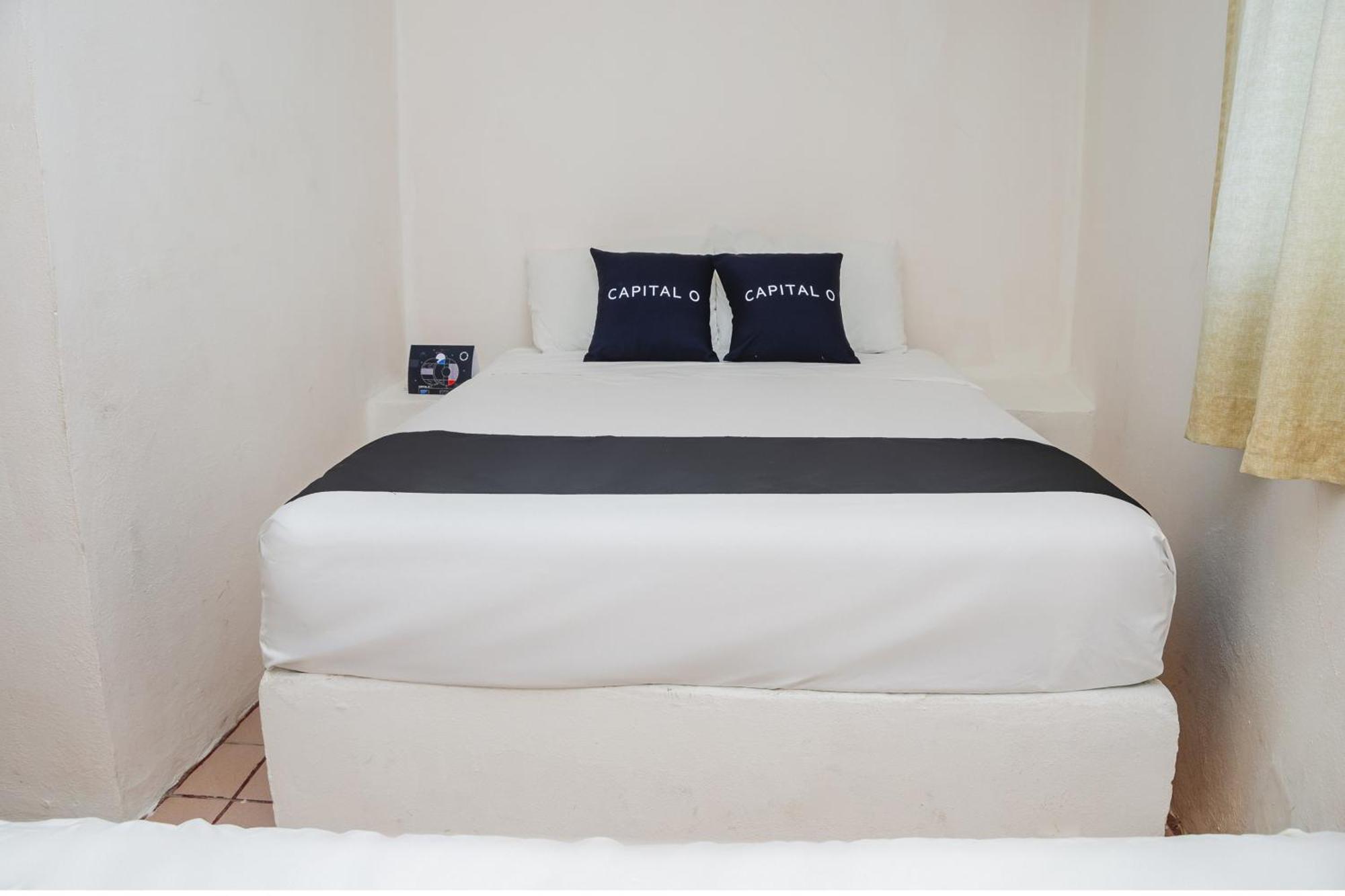 Hotel Capital O Dos Mares,